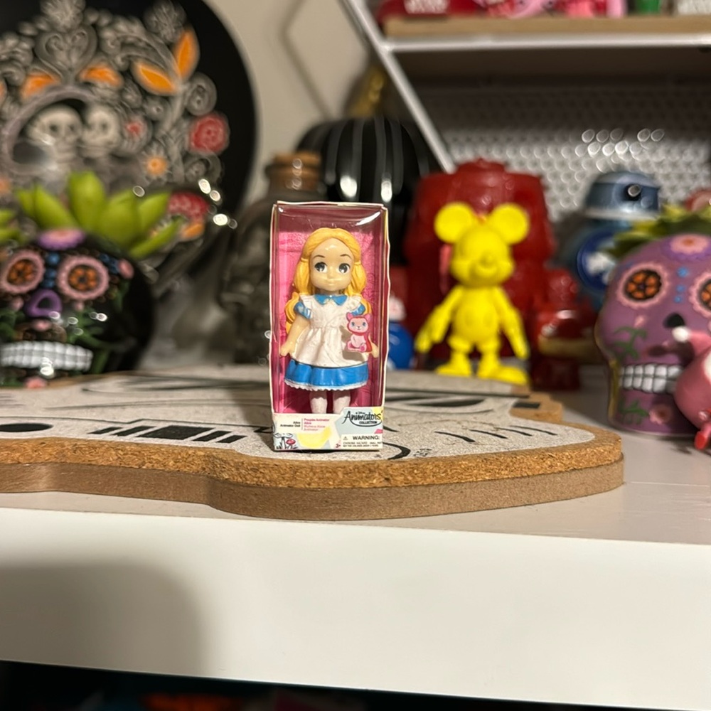 Disney store mini brand series. Alice